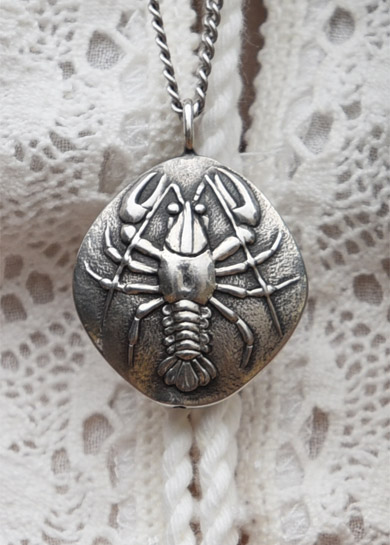 A 925 silver crab pendant cast by Old World craftsmen in Pragued destined to be part of the Sea Creatures collection of silver jewelry by designer Kamila Kubelik