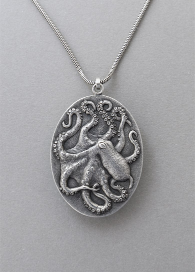 Verso of a 925 silver pendant cast by Old World craftsmen in Prague with an octopus motif and an Arizona turquoise cabochon on its recto, a unique piece in the Sea Creatures collection of designer Kamila Kubelik