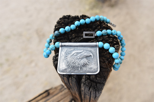 Arizona Boulder turquoise rounds on a strand necklace, with a rectangular 925 silver eagle motif pendant cast by Old World craftsmen in the Czech Republic