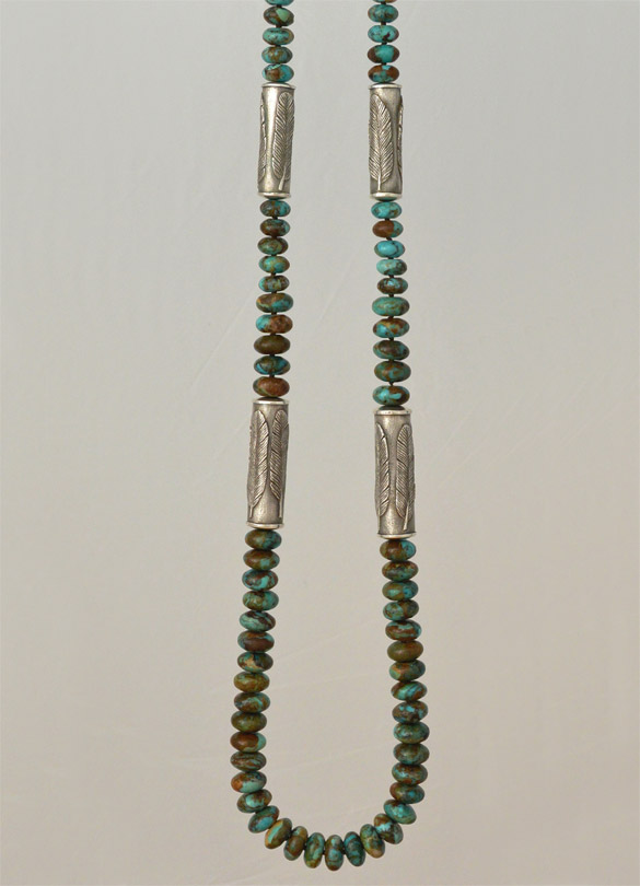 Old World cast 925 silver cylinders bearing feathers on necklace of Arizona Boulder turquoise rondelles, from jewelry collections by Kamila Kubelik, inspired by visits to the American Southwest